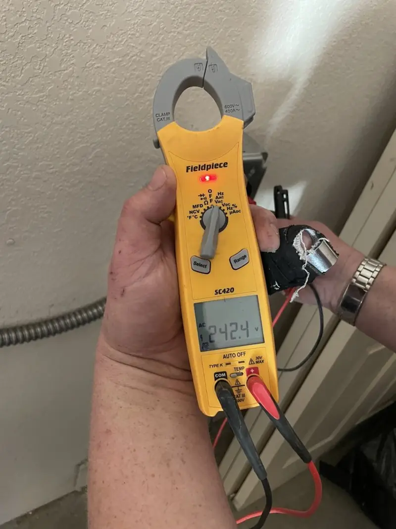 Voltage testing with clamp meter during Hot Tub / Pool Electrical Wiring in Dove Valley